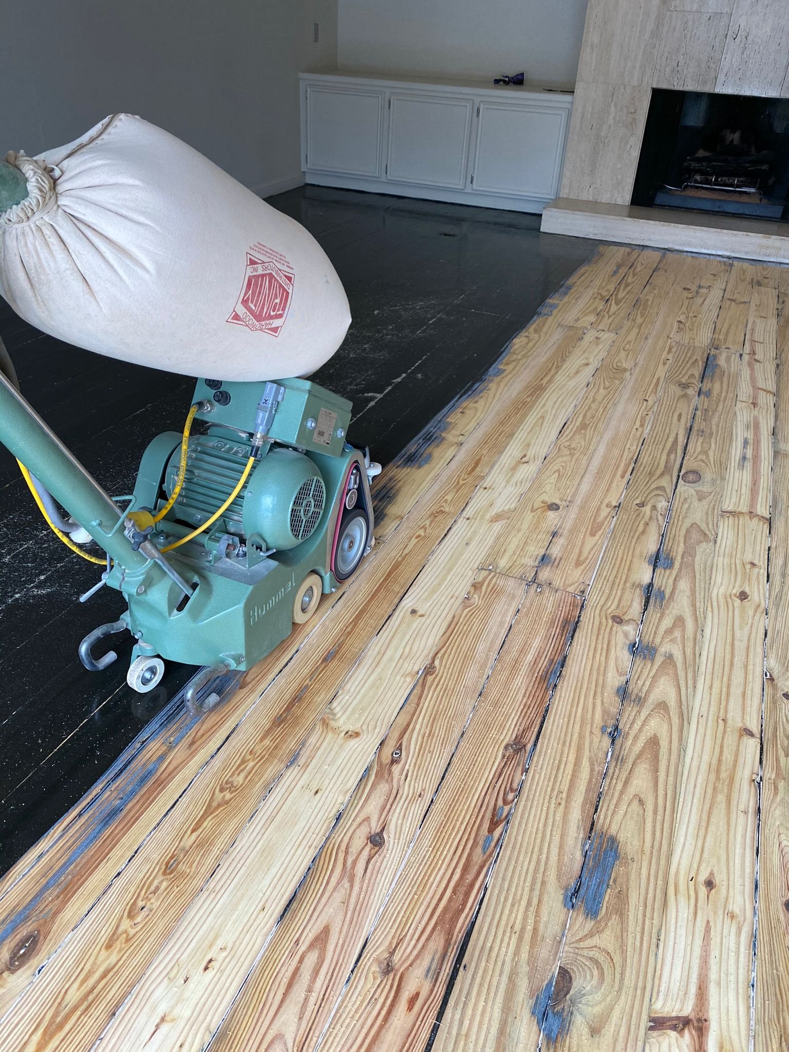 Sanding and refinishing of new and used wood floors.